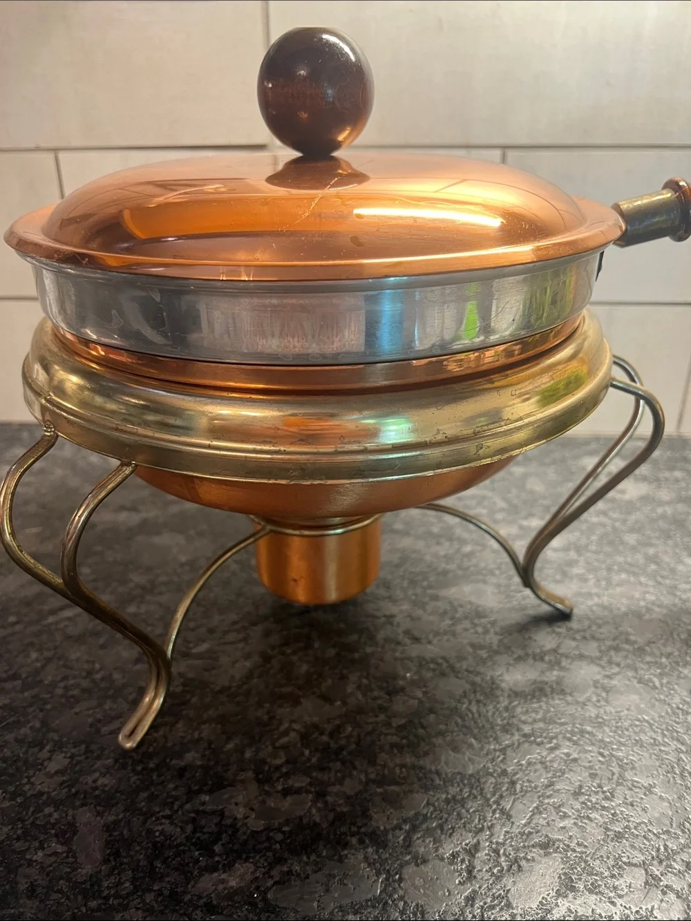 Large copper wood handled fondue pot on stand. Parties, get togethers.